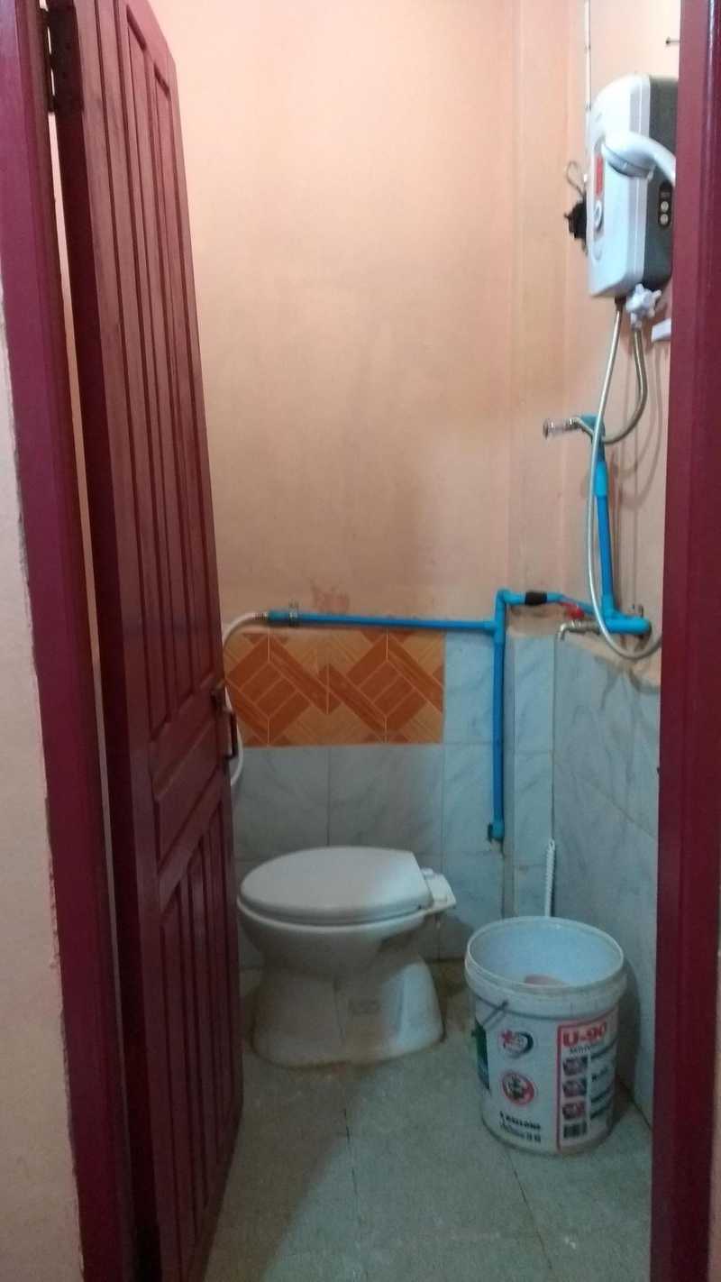 All mod cons. Who needs a sink when you have a bucket?